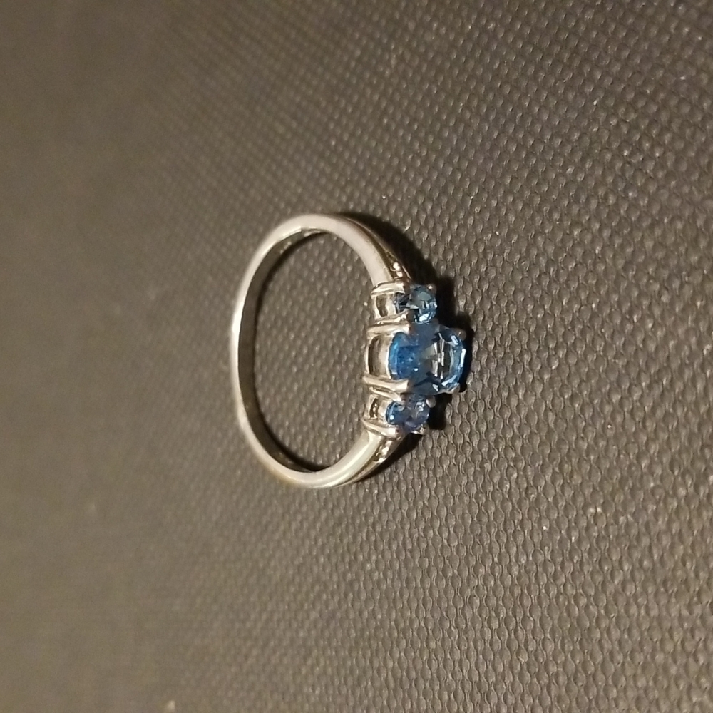 Sterling silver ring with blue stones